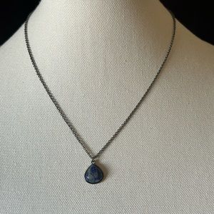 Necklace with blue stone pendant